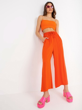 Pomarańczowe spodnie materiałowe z wiskozy SUBLEVEL